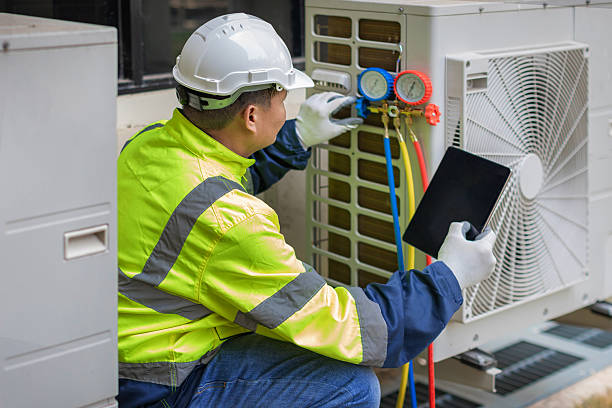 Professional Ac Installation technician working in River Falls, WI